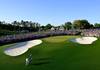 Masters champion Scottie Scheffler walks toward the No. 18 green with his caddie Ted Scott after winning the Masters after the final round of the Masters at Augusta National Golf Club, Sunday, April 10, 2022.