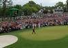 Masters champion Tiger Woods celebrates after he made his putt on hole No. 18 green to win the Masters during the final round of the Masters at Augusta National Golf Club, Sunday, April 14, 2019.